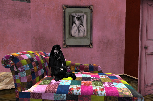 Miss Liza Veliz relaxes on the sofa gift from La Petite Mort